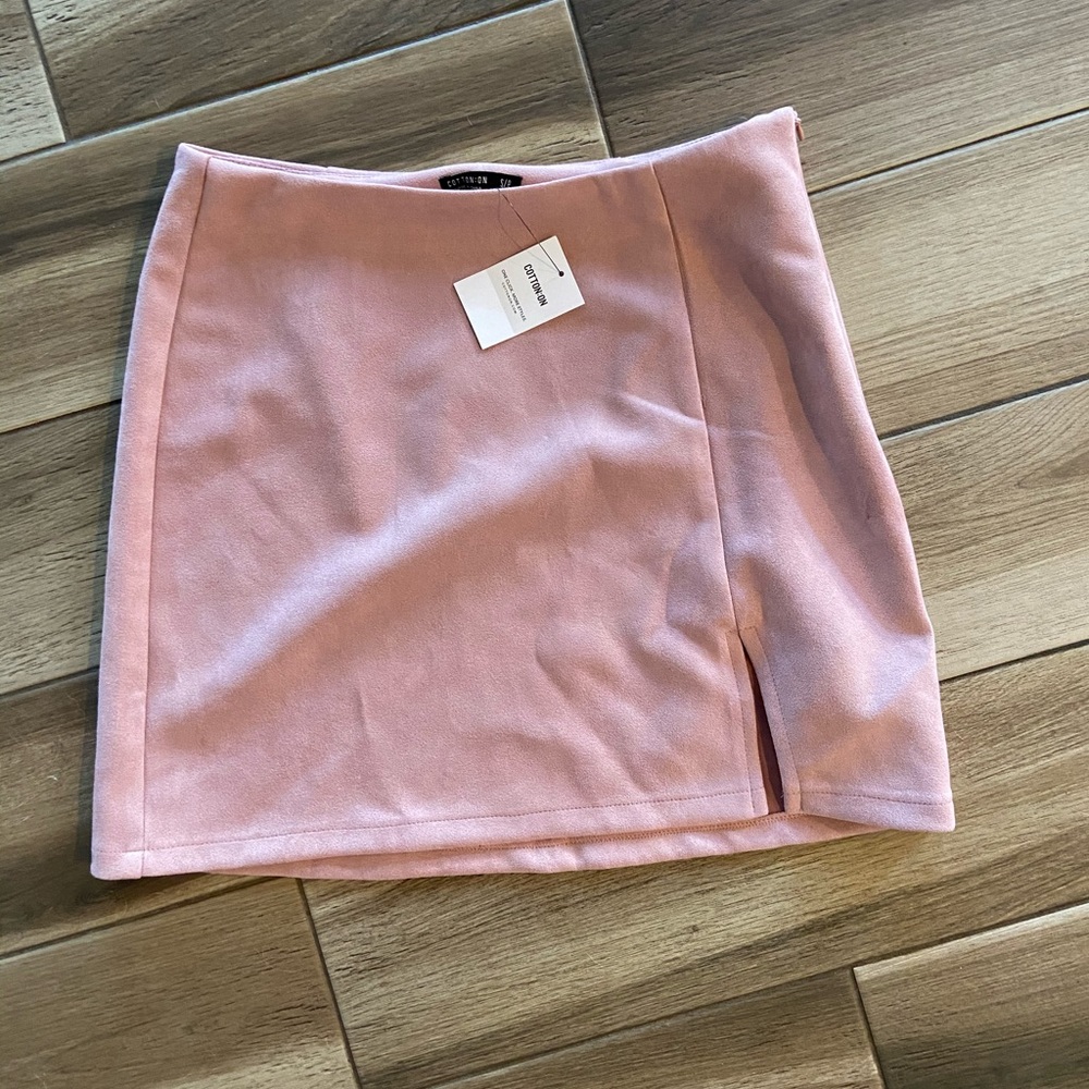Pink suede mini skirt
